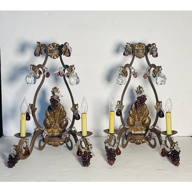 Gorgeous pair of antique wrought iron sconces with glass fruits and purple grape clusters.