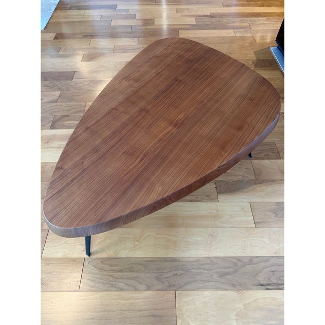 Beautiful Cassina Mexique Low Table in solid wood with the signature sculpted triangular top and steel base. Purchased new...