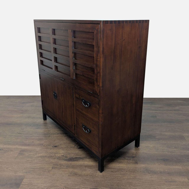 This Room & Board desk by Maria Yee features a solid wood construction with a rich, warm finish. The top folds down to...
