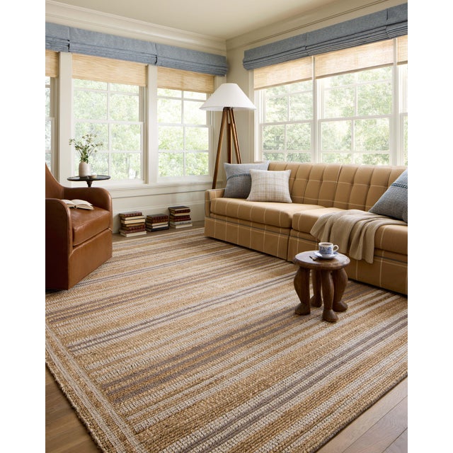 The Judy Collection from Chris Loves Julia x Loloi is a handwoven area rug made with natural fibers for an easygoing yet...
