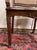 Louis XV period carved walnut office chair Cane seat and back Abundant carved decoration Violet-shaped Cabriole legs