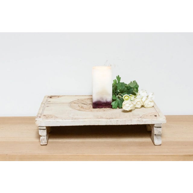An authentic rustic low bajot table from the Western himalayas. This vintage bajot tray is hand-carved with fun floral...