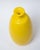 Handcrafted Pop Art yellow glaze ceramic bottle vase, circa 1960s. Stamped USA on bottom.