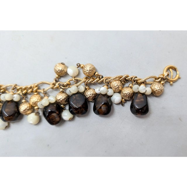 Brown Vintage 1960s Signed Napier Goldtone Faux-Topaz & Mother of Pearl Charm Bracelet For Sale - Image 8 of 14