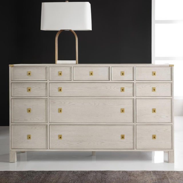 Classic campaign furniture, this refined dresser combines traditional military aesthetics with contemporary craftsmanship....