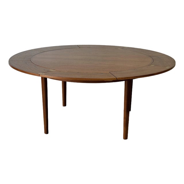 Dyrlund Lotus Round Teak Dining Table With Flip-Out Extension Leaves – Vintage Danish Mid-Century Modern For Sale