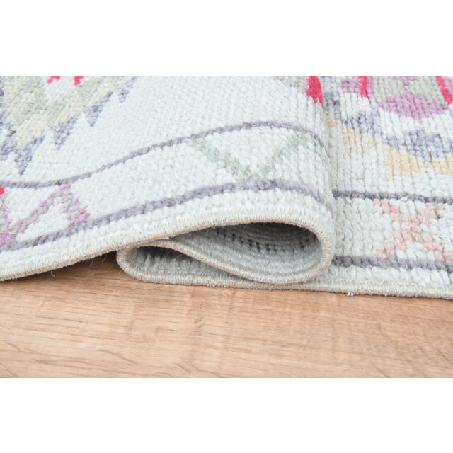 Tribal Vintage Turkish Oushak White Runner with Colorful Motifs For Sale - Image 3 of 11