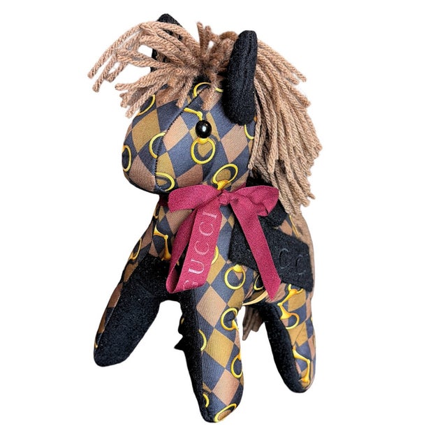 Vintage finds exclusively ours.&nbsp; Our vintage Gucci scarf animal menagerie is sustainably sourced, locally made with a...