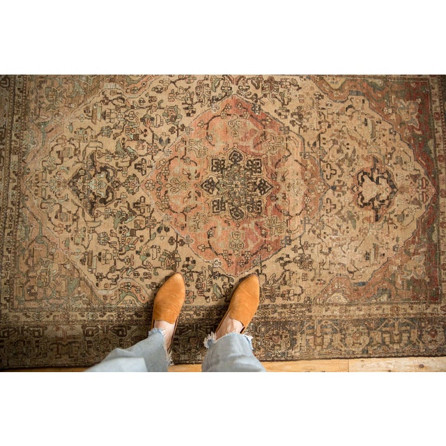 :: Large scale center medallion adorned at either end by Samovar stylized finials atop a covered ground of vines and...