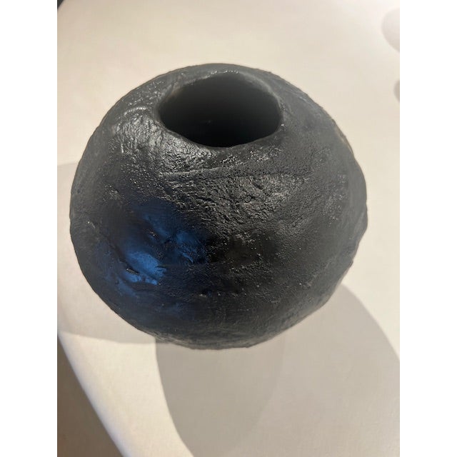 Dimensions: 10’ w x 9’ h Material: stoneware Finishing: unglazed Color: black Edition: one-of-a-kind