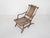 Sculptural solid wooden lounge chair. The lacquer has turned a bit white through the years, but this gives a nice patina...