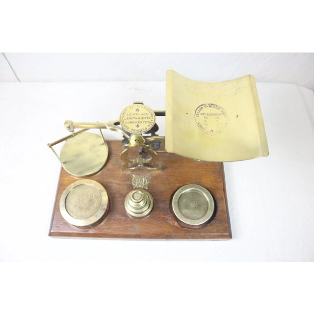 A very high quality English brass postal scale with a walnut base dating from the end of the 19th century. It is in...
