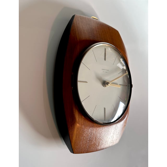 This early edition wall clock in modernist design from the 'ATO-MAT' line was produced by the quality manufacturer...