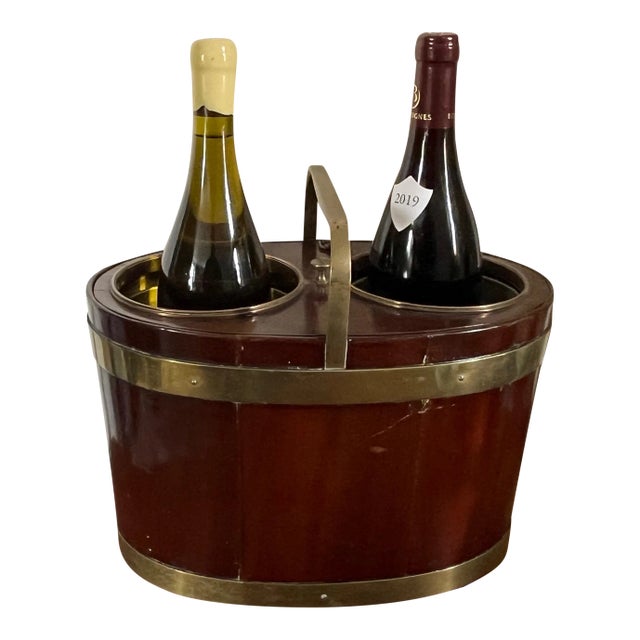 Antique 18th century George III brass bound mahogany wine bottle caddy circa 1790. Oval cellarette with room for two wine...