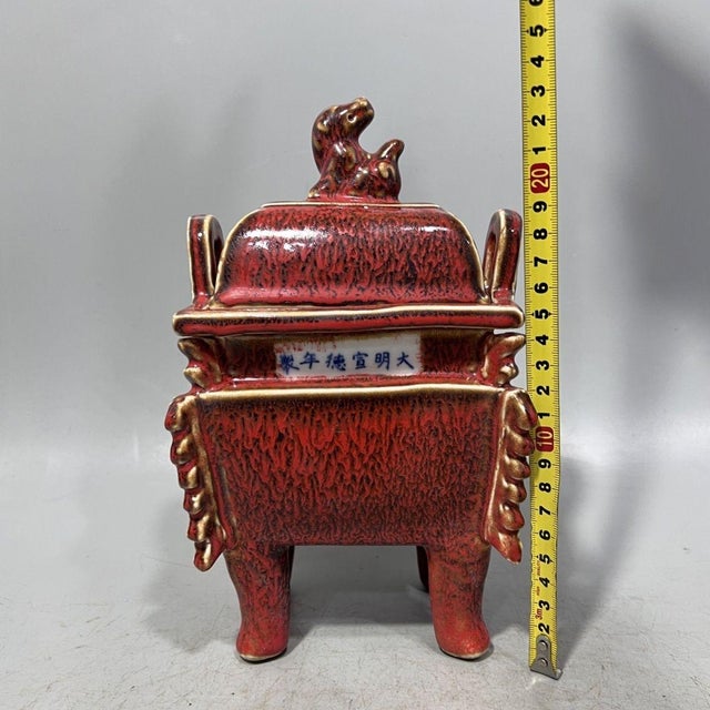 This exquisite piece is a Chinese porcelain censer designed in the archaistic style of an ancient bronze Fang Ding (square...
