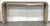 Organic Modern Beige Reeded Waterfall Console Table, showroom floor sample