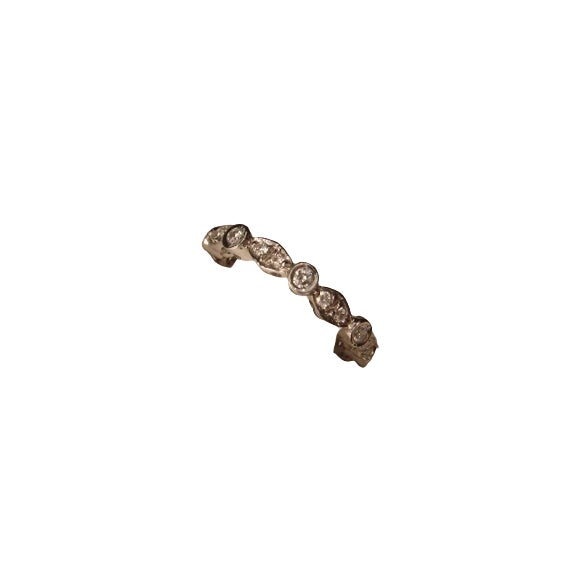 18K white gold eternity wedding band featuring a continuous row of round diamonds totaling 0.50 carats. Band width 3mm,...