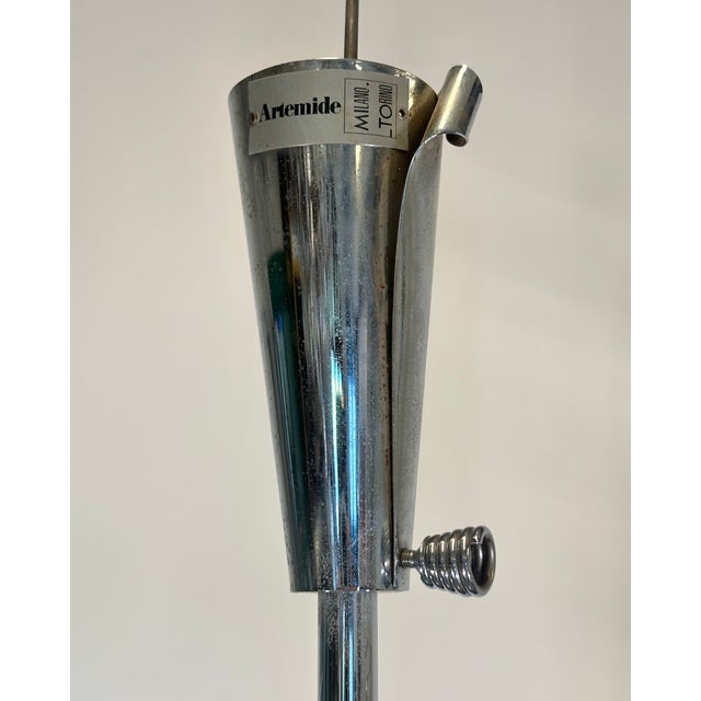 Chandelier by Toni Cordero for Magistretti from the 1980s, chromed steel structure and glass, the chrome plating will be...