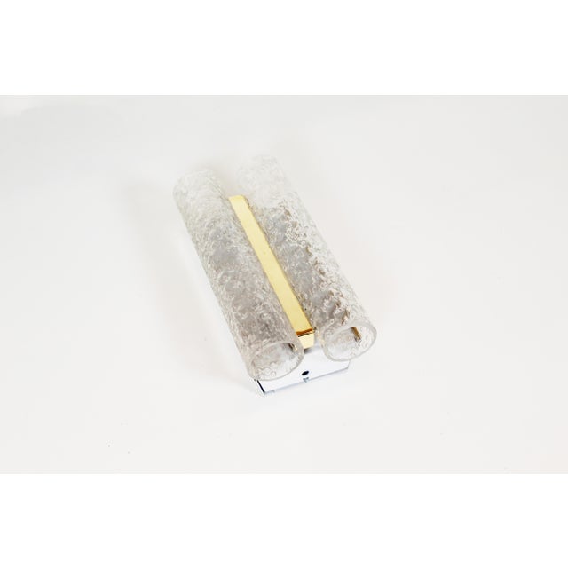 Single wall lamp in metal, brass, and glass by the German company Doria. In very good condition with renewed wiring. No...