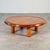 Rare round coffee or sofa table in solid stained pine, produced in France during the late 1960s. The design captures the...