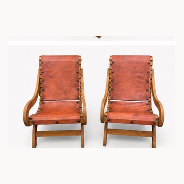 I absolutely love this pair. They’re one of those chairs that stop people in their tracks. Made from solid pine with thick...