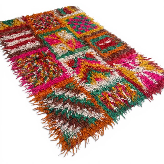 This exceptional vintage Filikli Tulu rug from Turkey, dating back approximately 90 years, is a beautiful example of...