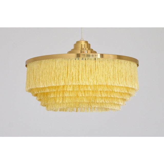 This rare pendant light was designed by hans-agne jakobsson and produced by his company in markaryd, sweden in the 1960s....