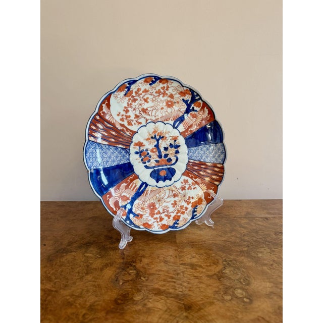 Quality antique Japanese imari plate with a scalloped shaped edge, having a quality antique Japanese imari plate with a...