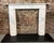 MISSING TOP MANTLE PIECE! A stunning example of timeless craftsmanship, this 19th Century Carrara Marble Fireplace...