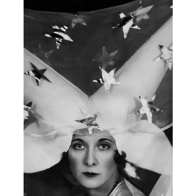 "Two-Horned Hat" by Sasha 5th November 1929: Lady Castlerosse modelling the medieval-style costume and wimple she will...