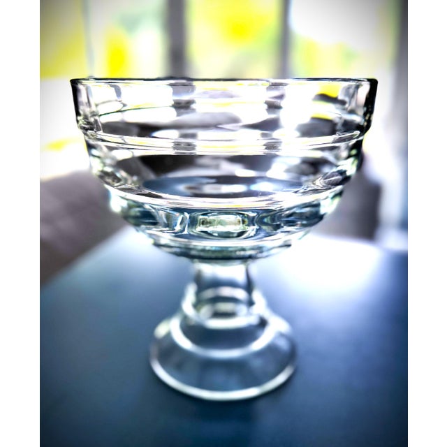 Your layered desserts will become an irresistable work of art in this art deco inspired glass pedestal trifle bowl! In...