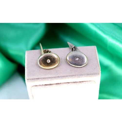 Oval-shaped white gold cufflinks with two brilliant-cut diamonds. Metal: Gold. Origin: Portuguese. Brand: Formiga. Weight:...