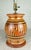 1994 Moravian redware pottery lamp by David T. Smith Turtle Creek Pottery in Morrow, Ohio. The lamp has geometric designs...