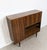 Versatile mid-century vintage highboard combining storage and multiple functions. The main compartment can be used as a...