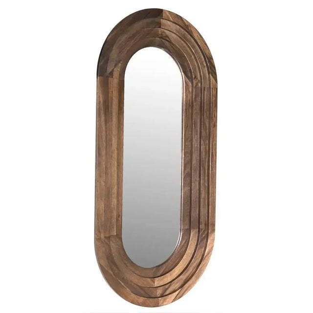 The New Fuss Mirror is a statement piece, crafted from Walnut and adorned with a luxurious Dark Walnut finish. With...