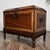 Rare and striking Spanish Colonial trunk by Alfonso Marina featuring an intricate engraved marquetry border, turned legs,...