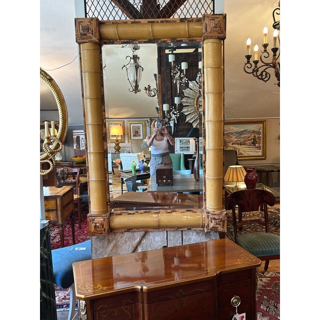 A rare very dramatic monumental vintage bamboo and rattan mirror having lusciously chunky frame and beveled mirror. Can be...