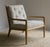 Pair of 1950s T.H. Robsjohn Gibbings armchairs, newly reupholstered in a striped linen fabric. These lounge chairs feature...