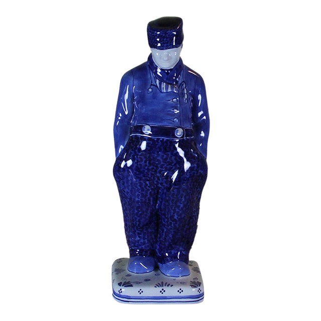 1960’s Vintage Delft Figurine-Peasant, With Blue Floral Decoration For Sale