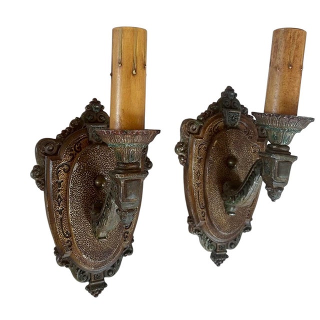 These are the nicest sconces for so many homes. Simple yet great detail with hints of the burgundy berries and pale green.