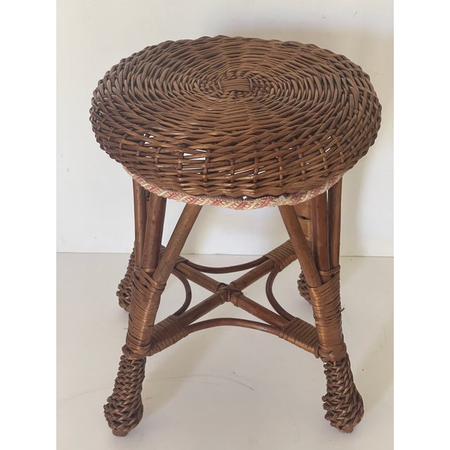 Handwoven mid century rattan wicker stool.