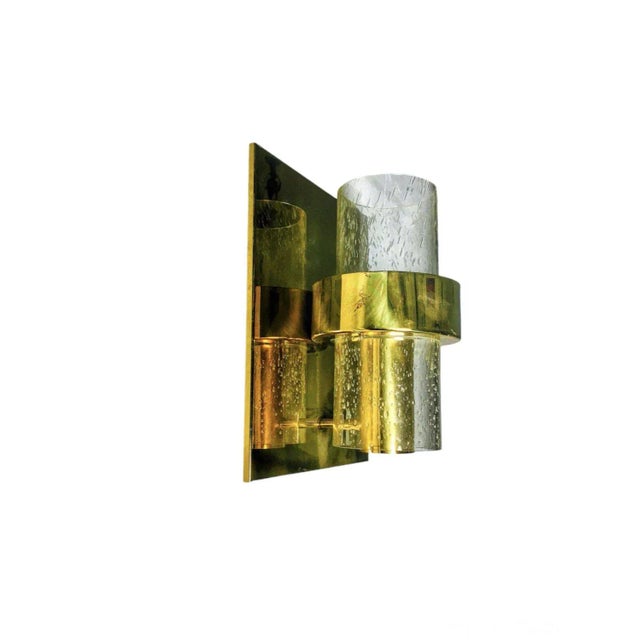 Exceptional Scandinavian design wall lamp with brass structure and bubble glass shade. Designed by Jonas Hidle and...
