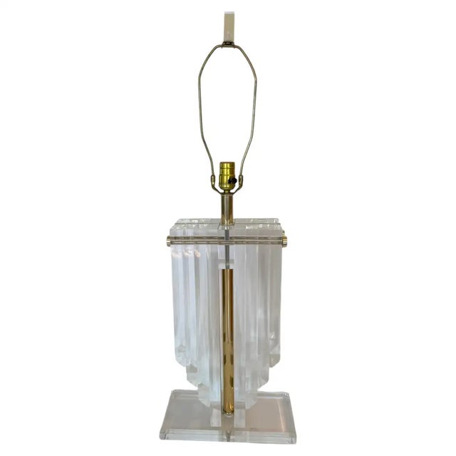 Capture the essence of Space Age optimism and Hollywood Regency luxury with this monumental architectural skyscraper table...