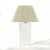 This spectacular table lamp has an oval base of 3" thick Lucite, the finest quality brass hardware, a perfectly matched...