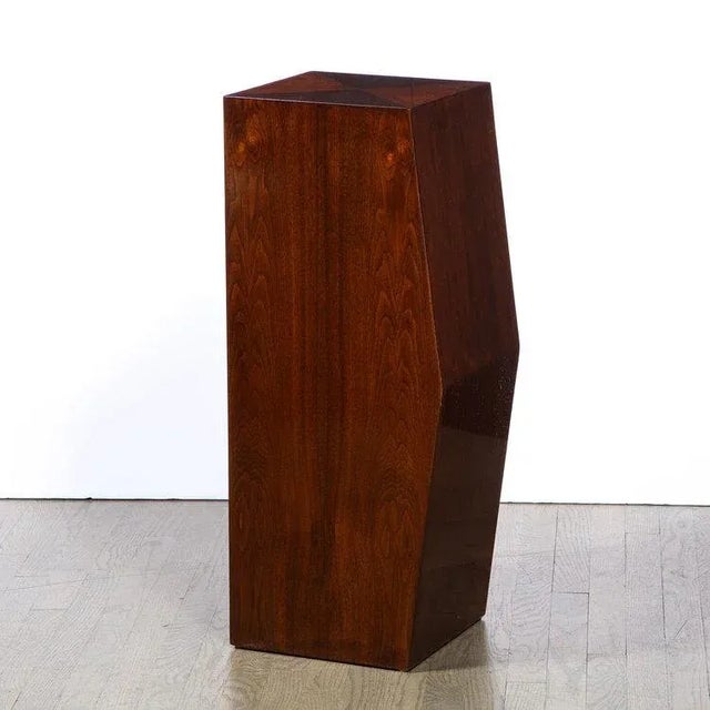 This elegant modernist pedestal was realized in the United States during the latter half of the 20th century. It Composed...
