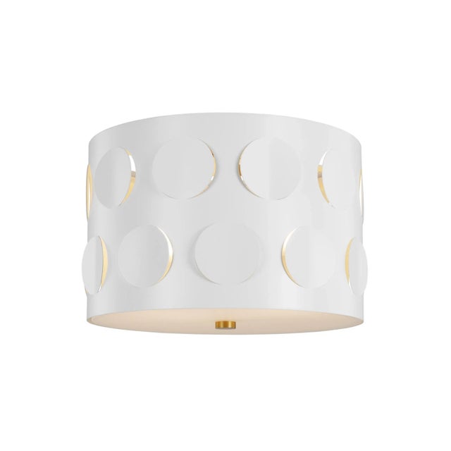 Dots are iconic to the kate spade brand—a simple and playful graphic motif. Dottie takes an iconic kate spade dot motif...