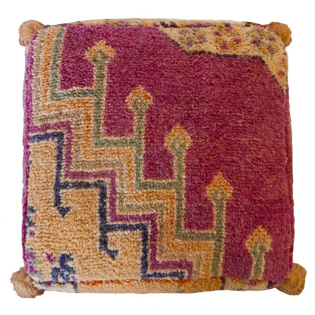 Moroccan floor pouf made from an abstract midcentury rug handwoven in apricot, magenta, sage green and indigo hand spun...