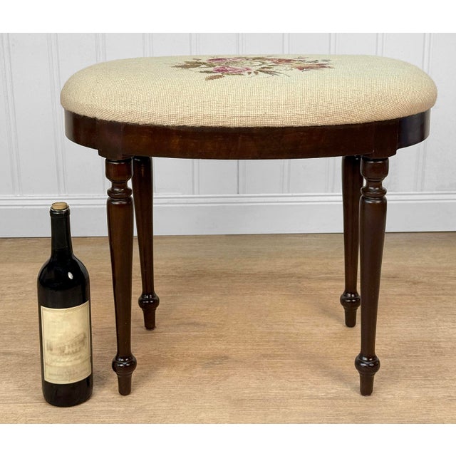 An Early 20th Century Traditional Needlepoint Oval Vanity Seat Solid Mahogany Construction with a Deep Satin Finish Off-...