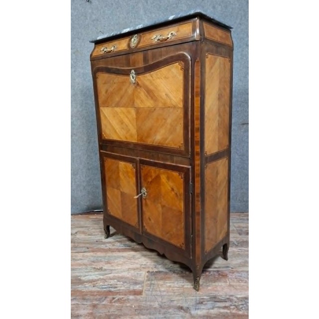 Louis XV period marquetry and veneer secretary desk, 18th century Charming Louis XV period drop-front secretary desk,...