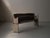 Long rustic bench, crafted from solid wood in 19th-century France, features a full backrest made of wide planks with a...